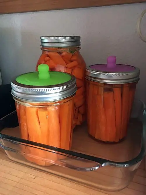 Store fermented carrots in a dark space such as the pantry or in a cupboard.