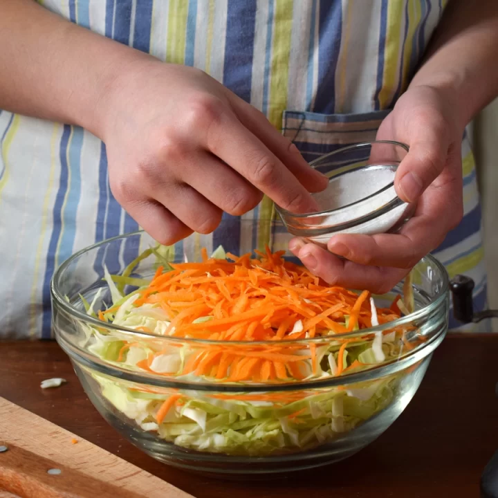 salt cabbage for a sauerkraut recipe