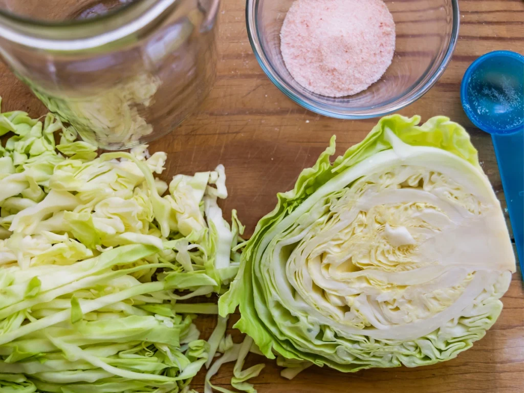 slice cabbage for juniper and caraway sauerkraut recipe